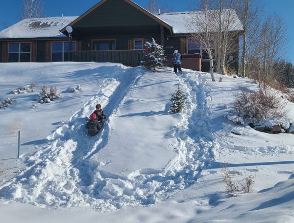 Evergreen Ranch Vacation Rental Home 9 Sled off the front of our home.